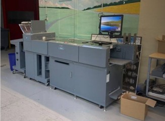 Creasing, cutting and folding machine